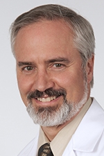 Dr. Raymond Cartier